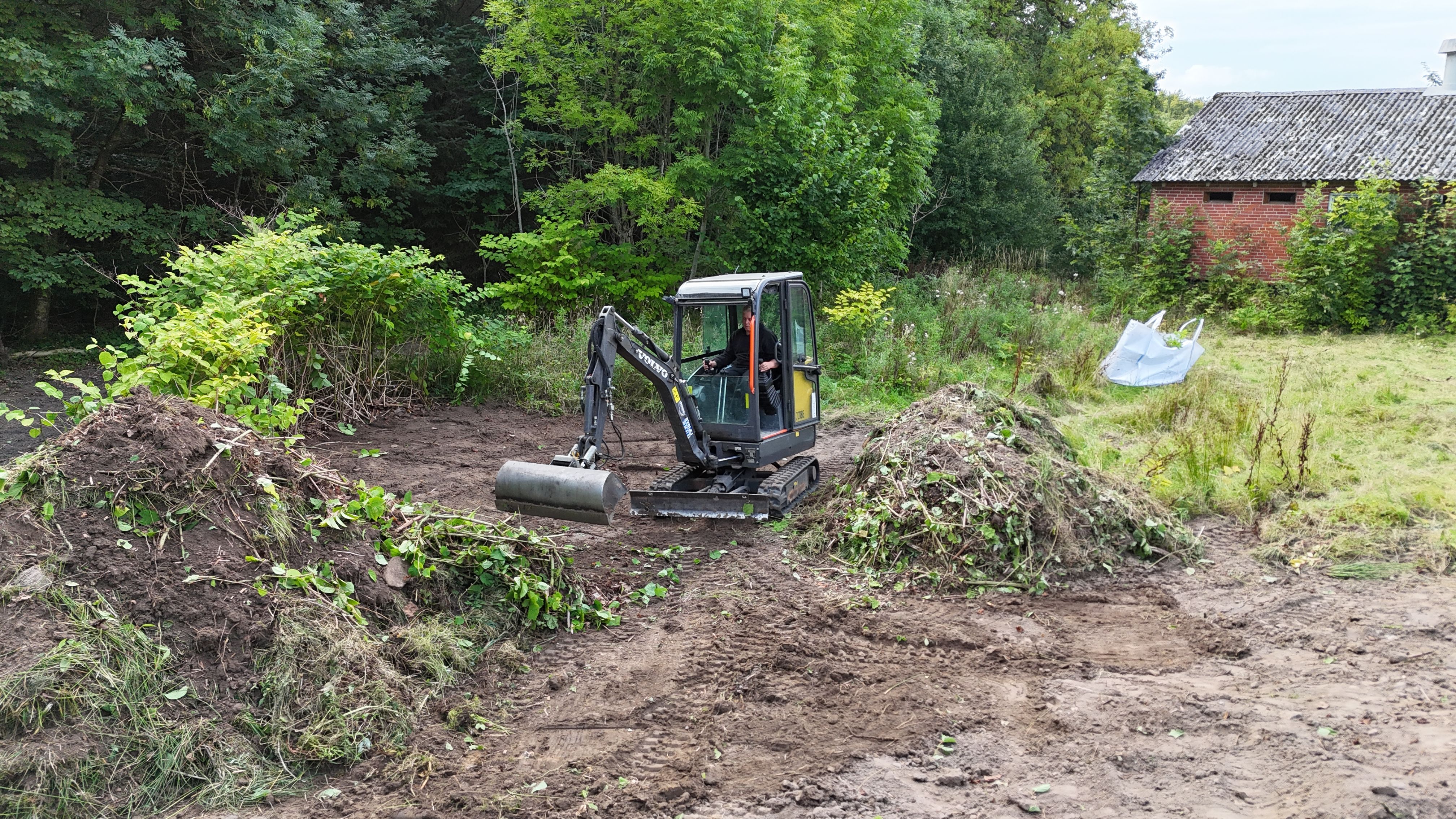 Kloakmester arbejder på anlægsarbejde
